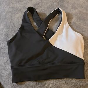 Black and white cross strap sports bra.